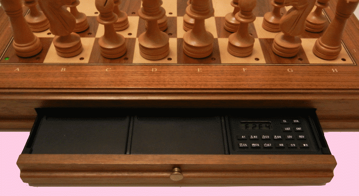 �Mephisto Mirage� chess game module playing inside a Mephisto Muenchen Auto-Sensory Board.